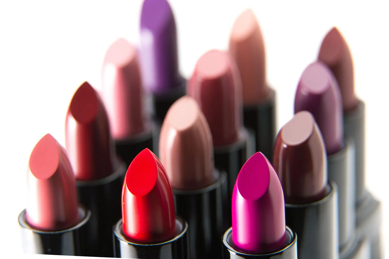 A group of lipsticks in rose, red, plum and magenta shades